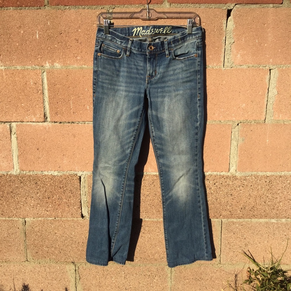 MADEWELL BOOT LEGGED DISTRESSED JEANS.